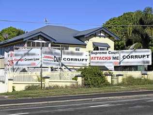 EYESORE: Ipswich City Council issued Russell Matthews an enforcement notice to remove the signage on his Booval property last month. Picture: Cordell Richardson