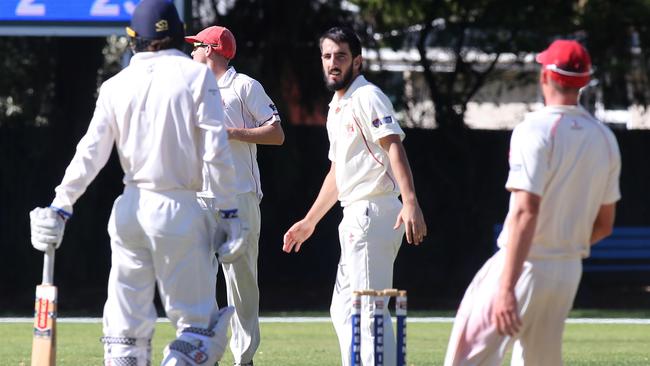 Adelaide star Cam Valente, pictured staring down Sturt’s Tom Kelly last round, will be crucial to his sides chances on day two. Picture: AAP/Dean Martin