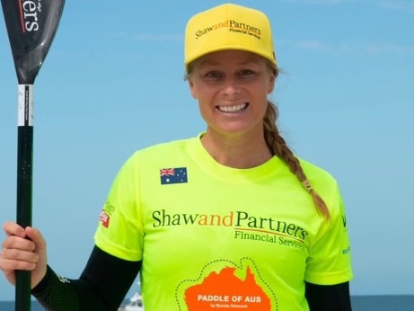 Ironwoman braces for sharks in record 16,000km paddle around Australia