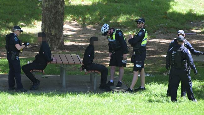 Alleged members National Socialist Network are arrested in the CBD on January 26. Picture: Tracey Nearmy/Getty