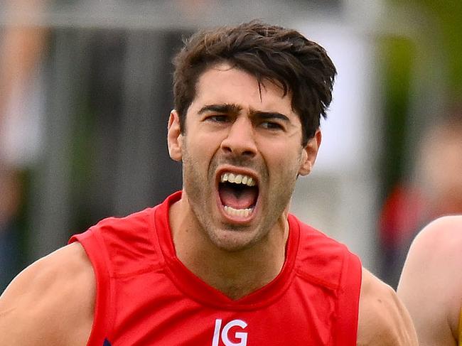 MELBOURNE, AUSTRALIA - FEBRUARY 18: Christian Petracca of the Demons celebrates a goal during an AFL practice match between Melbourne Demons and Richmond Tigers at Casey Fields on February 18, 2024 in Melbourne, Australia. (Photo by Morgan Hancock/Getty Images)