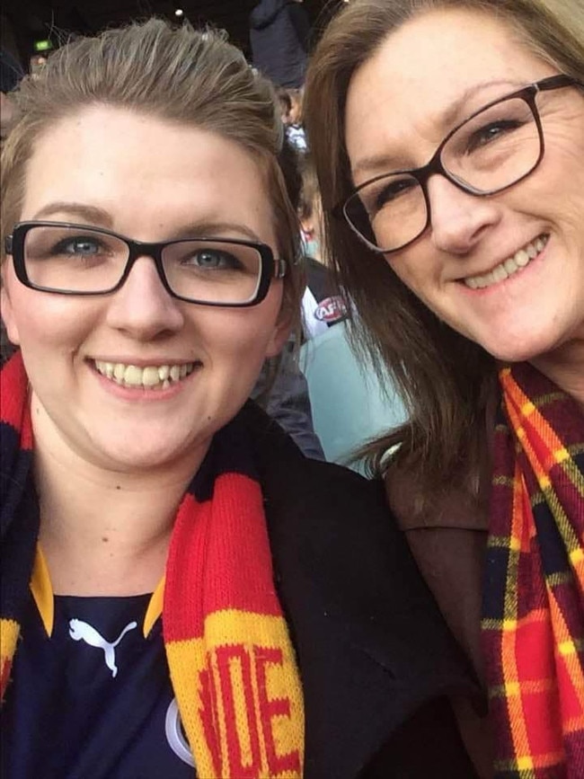 Maddison Hicks (L) with her mum Jane (R) at a Crows game. Picture: Supplied by family