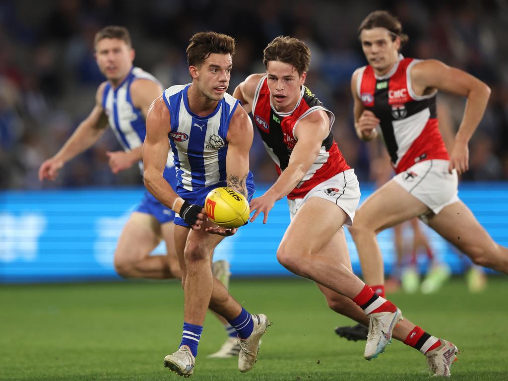 Jy Simpkin of the Kangaroos and Mattaes Phillipou of the Saints. Picture: Robert Cianflone/Getty Images