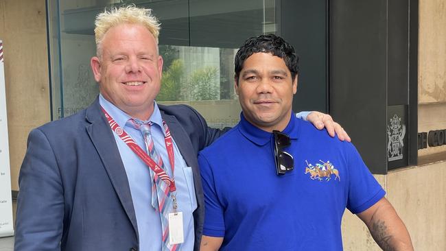 Chris Sandow with his lawyer Paddy O'Donnell outside Ipswich Courthouse after Mr Sandow's trial for police assault charges on February 9, 2023. Picture: Nicola McNamara