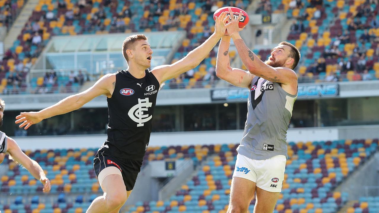 Port Adelaide’s Charlie Dixon was too strong for Liam Jones. Picture: Michael Klein