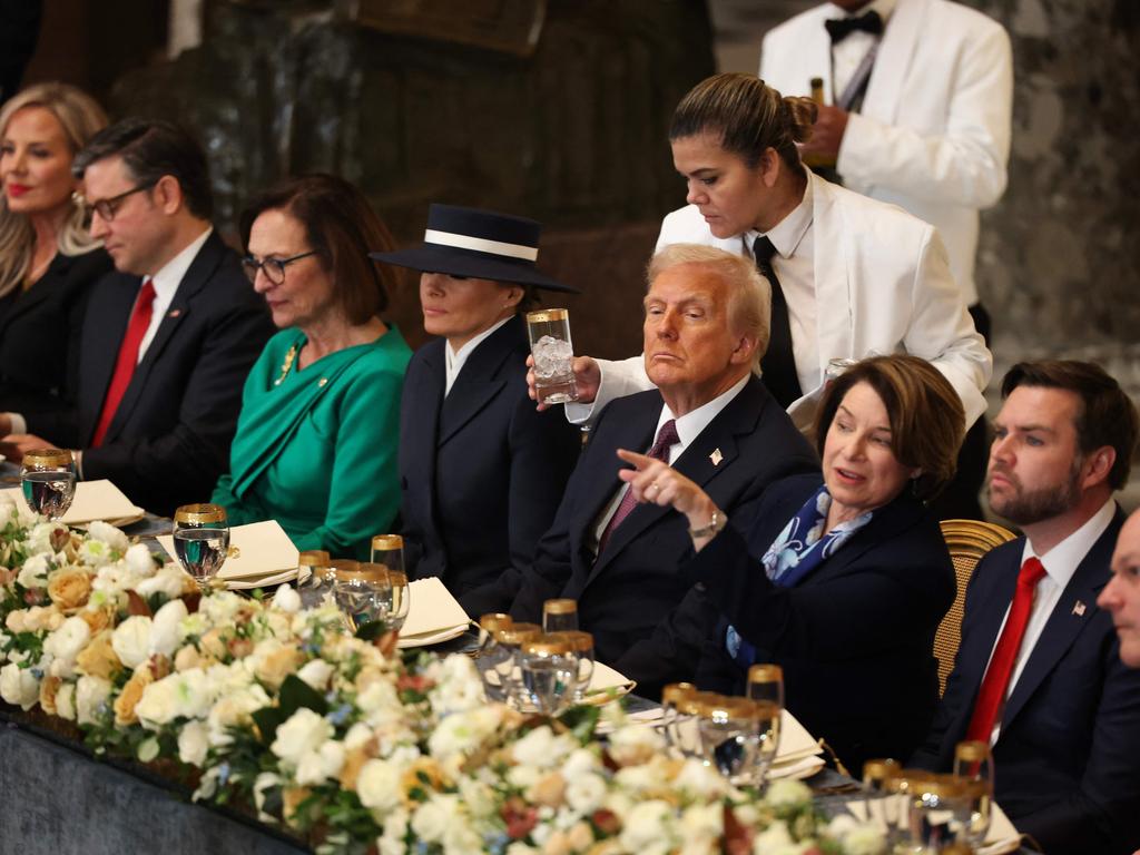 US Donald Trump at the luncheon following the ceremony. Picture: Getty Images via AFP