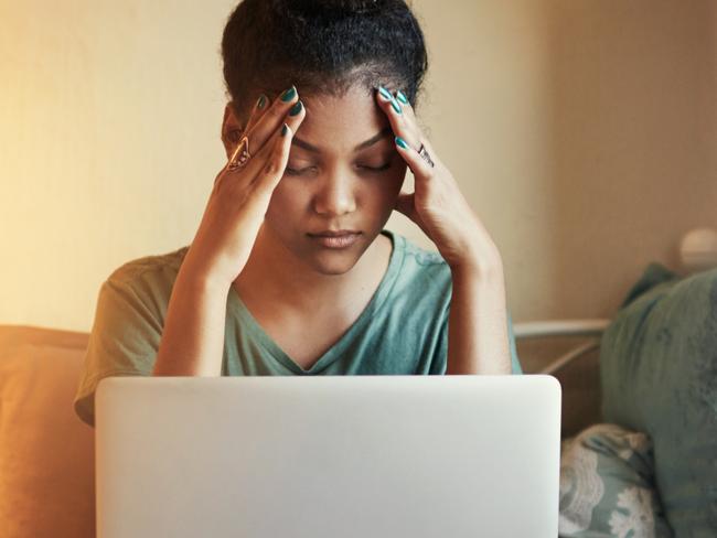 Full length shot of a young female student studying at home