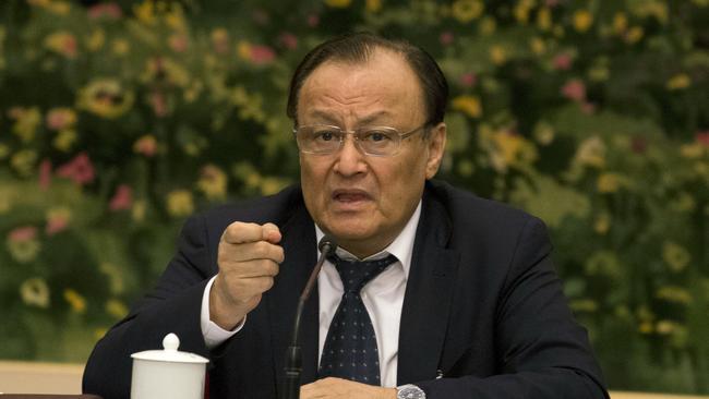 FILE - In this March 12, 2017, file photo, Shohrat Zakir, chairman of the Xinjiang Uyghur Autonomous Region, speaks on the sideline of the National People's Congress in Beijing, China. The senior Chinese official is describing the mass internment of ethnic minority Muslims in the countryâ€™s far west as a system of training centers that saves Muslims from religious extremism by teaching them to speak Mandarin and accept modern science.  It was a rare instance of the ruling Communist Party publicly detailing its vision of what the extrajudicial detention of an estimated 1 million ethnic minority Uighur and Kazakh Muslims is setting out to achieve. (AP Photo/Ng Han Guan, File)