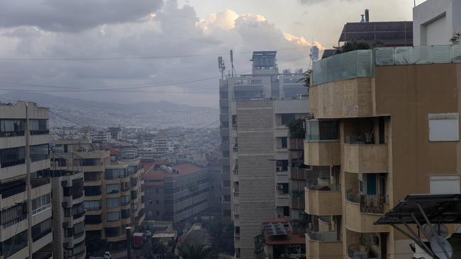 Smoke billows from an apartment after an Israeli airstrike in the neighborhood of Jnah in Beirut, Lebanon. Photo by Daniel Carde/Getty Images