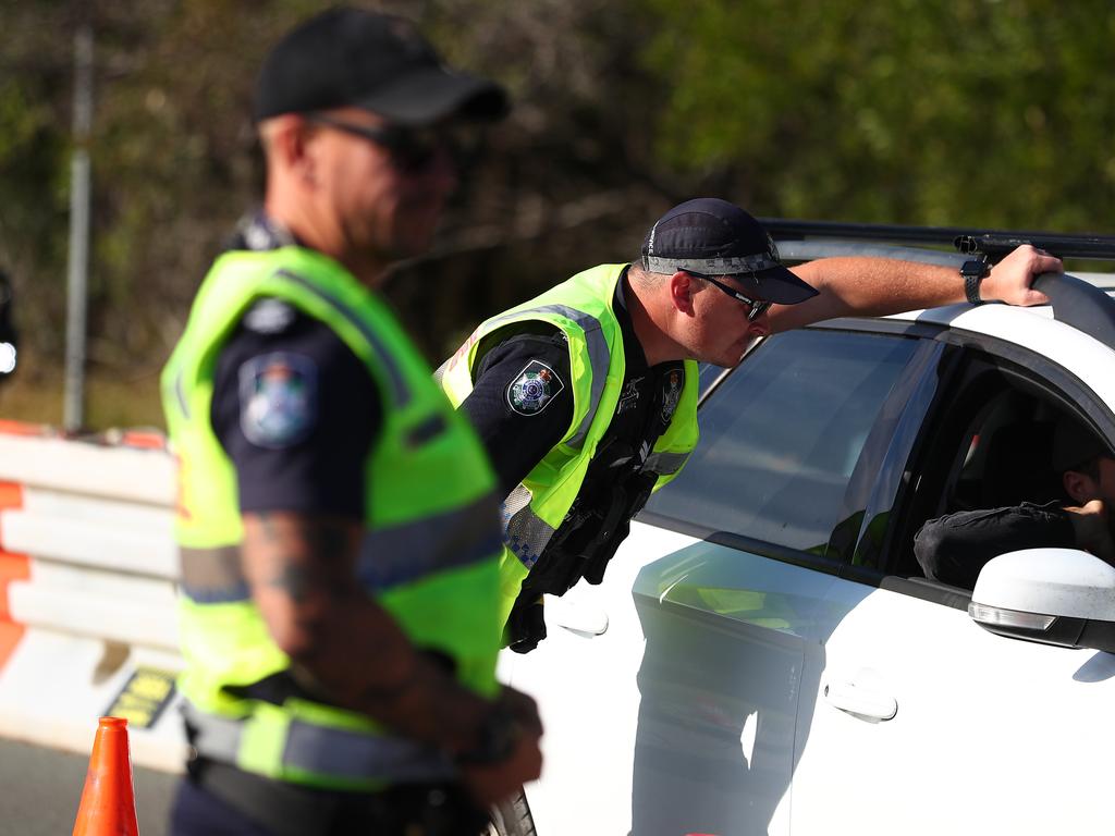 Queensland Police stop vehicles at the border. Picture: Chris Hyde/Getty Images