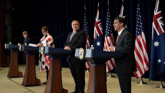 Australia's Minister for Defence Linda Reynolds, Australia's Foreign Minister Marise Payne and US Secretary of State Mike Pompeo listen while US Secretary of Defense Mark Esper speaks during a press conference at the US Department of State following the 30th AUSMIN on July 28, 2020, in Washington, DC. Picture: Brendan Smialowski / POOL / AFP