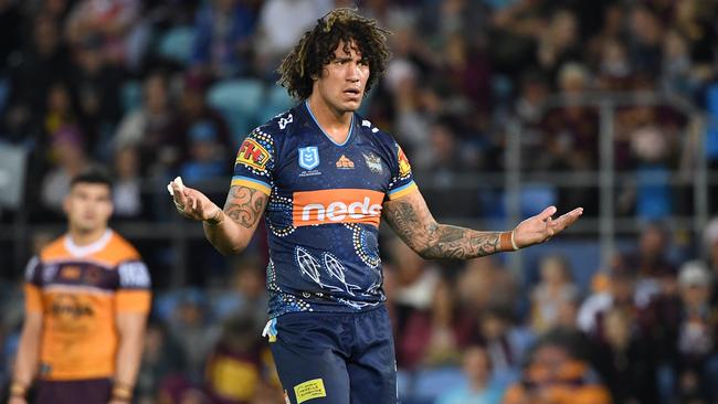 Titans player Kevin Proctor gestures towards the bench during interchange confusion during the Round 19 NRL match between the Gold Coast Titans and the Brisbane Broncos at CBus Super Stadium on the Gold Coast, Saturday, July 27, 2019. (AAP Image/Dave Hunt) NO ARCHIVING, EDITORIAL USE ONLY