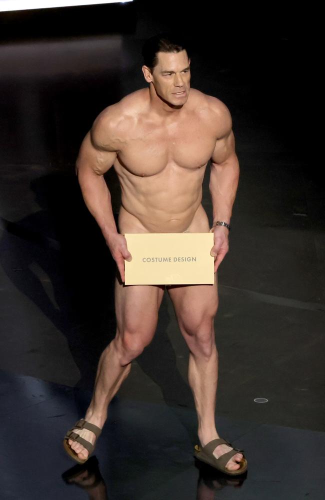 Cena shuffled onstage while naked and covering himself with an envelope. Picture by Kevin Winter/Getty Images.