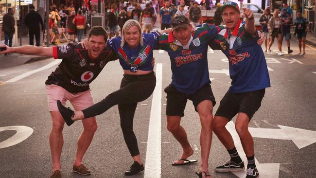 Magic round fans Troy Barakat, 38, Debra Montagu, 44, Nick Palmer, 38, and Jesse Bain, 38, on Caxton Street. Picture: Liam Kidston