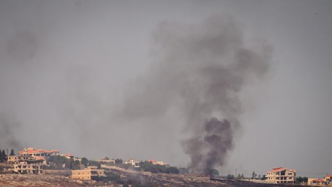 Smoke rises from a village across the border of Lebanon following a strike by the Israeli air force on October 4, in Rihaniya, Israel. Picture: Getty