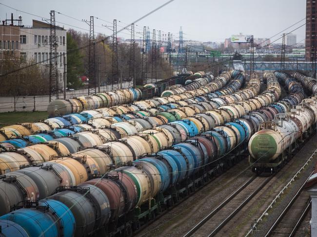 Rail wagons for oil, fuel and liquefied gas cargo stand in sidings at Yanichkino railway station, cose to the Gazprom Neft PJSC Moscow refinery in Moscow, Russia, on Monday, April 27, 2020. Oil prices plunged to within a whisker of $10 a barrel after a major index tracked by billions of dollars in funds bailed out of near-term contracts for fear prices may turn negative again. Photographer: Andrey Rudakov/Bloomberg