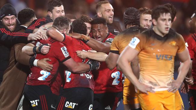 Crusaders players celebrate victory at full time. Picture: Getty Images