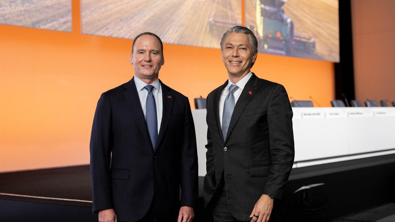 BHP chair Ken MacKenzie and chief executive Mike Henry at the annual general meeting in Brisbane. Picture: Luke Marsden