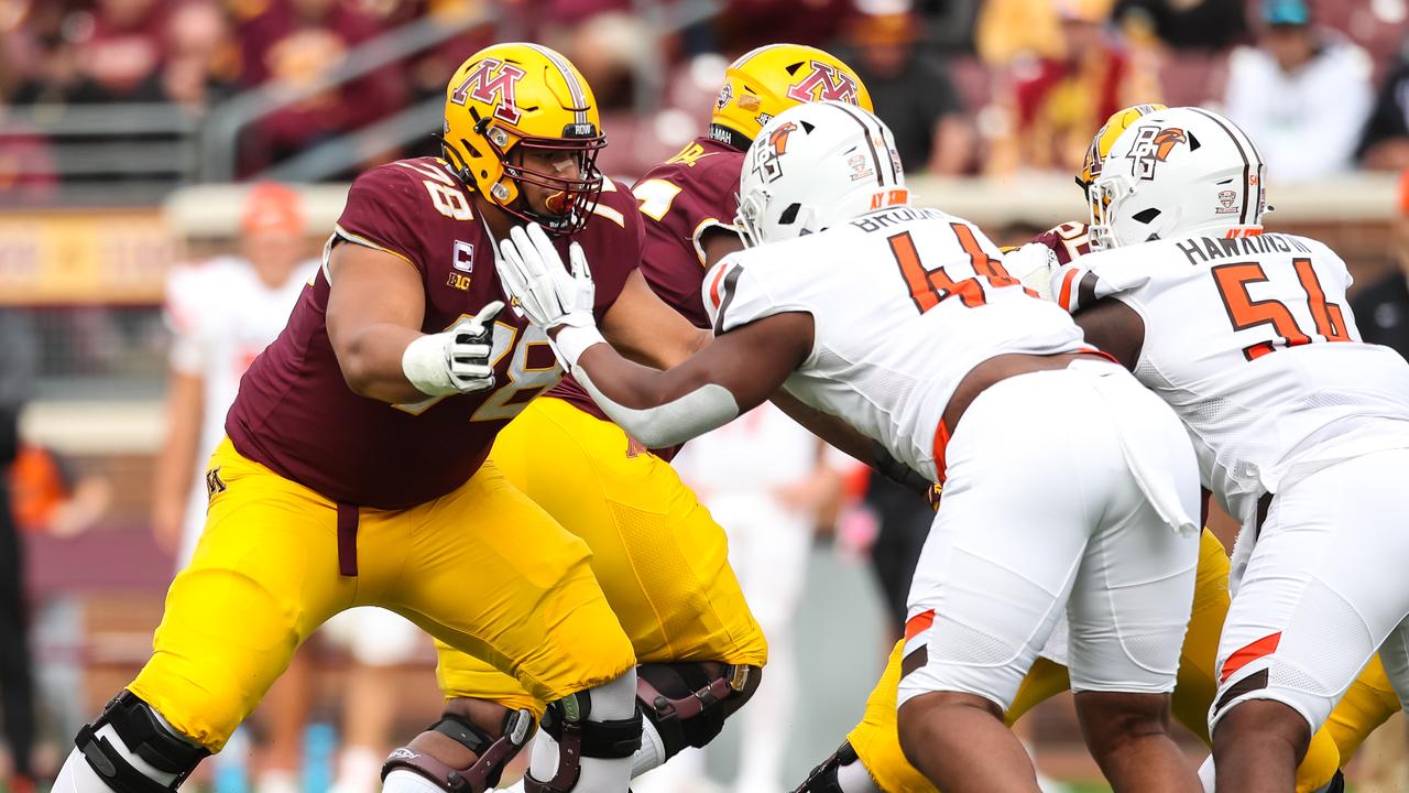 Baltimore Ravens offensive tackle Daniel Faalele plays against the