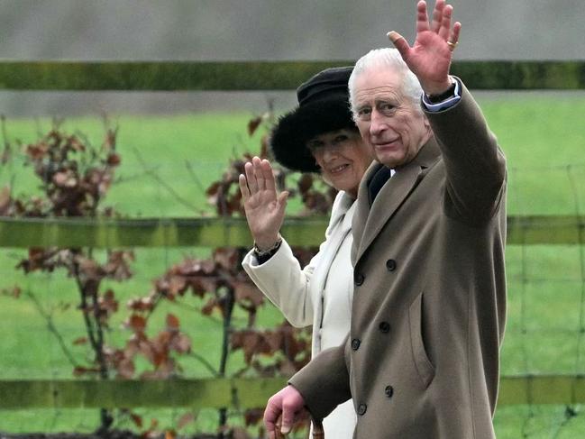 King Charles III and Queen Camilla waves as they leave after attending a service at St Mary Magdalene Church after his cancer diagnosis. Picture: AFP
