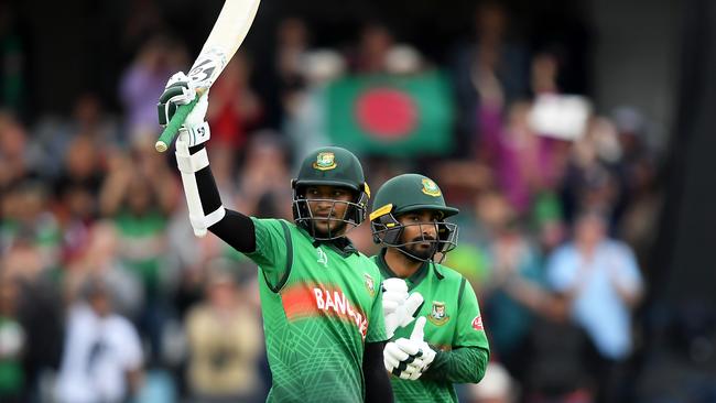 TAUNTON, ENGLAND - JUNE 17: Shakib Al Hasan of Bangladesh celebrates his century with Liton Das of Bangladesh during the Group Stage match of the ICC Cricket World Cup 2019 between West Indies and Bangladesh at The County Ground on June 17, 2019 in Taunton, England. (Photo by Alex Davidson/Getty Images)