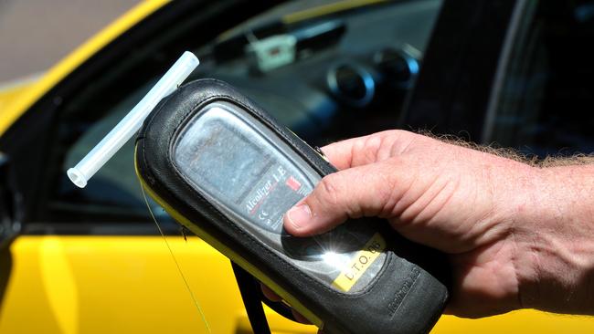 An unlicensed driver who claims he was fleeing from a domestic violence incident was busted drink-driving by police.