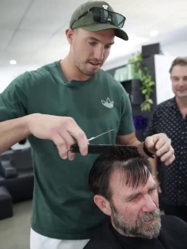 Corey Oates cutting KIIS97.3 co-host Kip Wightman’s hair. Photo: Instagram.