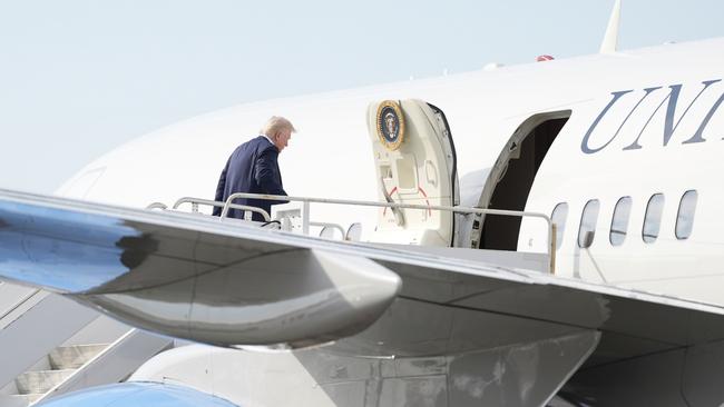 Donald Trump boards Air Force One at Palm Beach International Airport. Picture: AP.