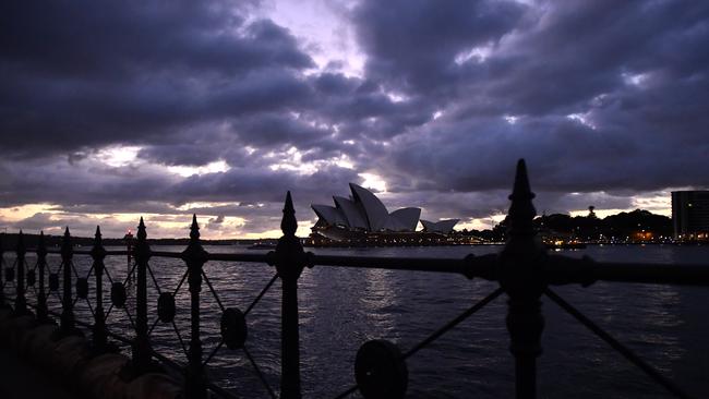 SYDNEY, AUSTRALIA - NewsWire Photos MARCH, 10, 2021: Cloud coverage over the Sydney Opera House at sunrise in Sydney. Picture: NCA NewsWire/Joel Carrett