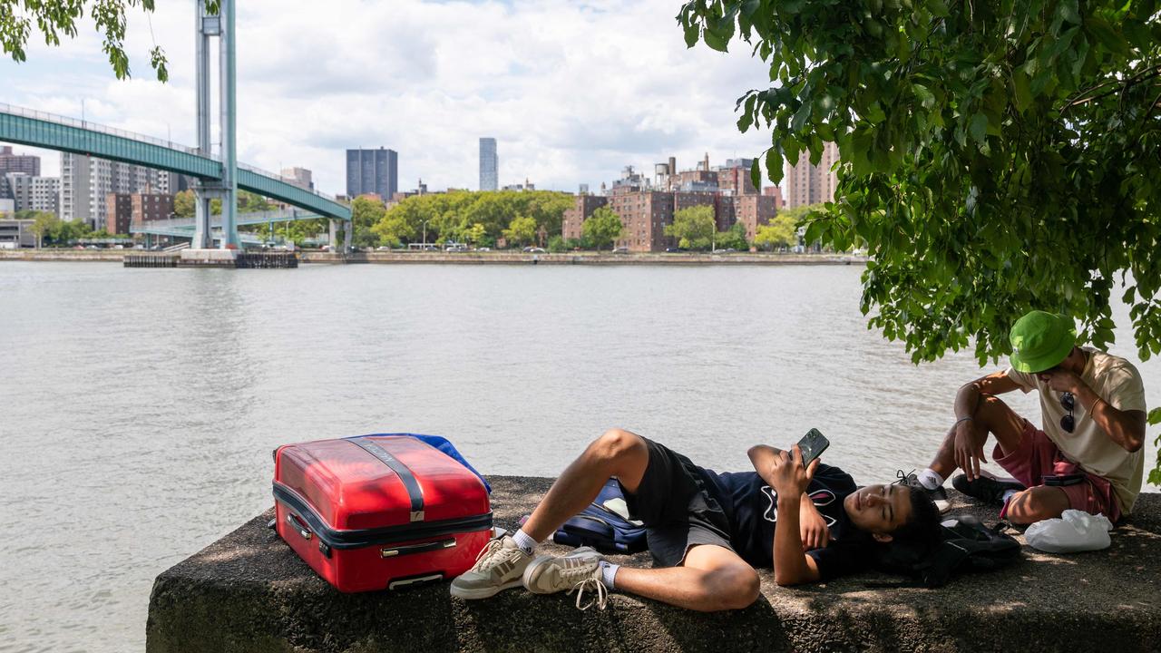 Young men from Venezuela who live in a tent after reaching their time limits at city-run shelters. Picture: Spencer Platt/Getty Images/AFP