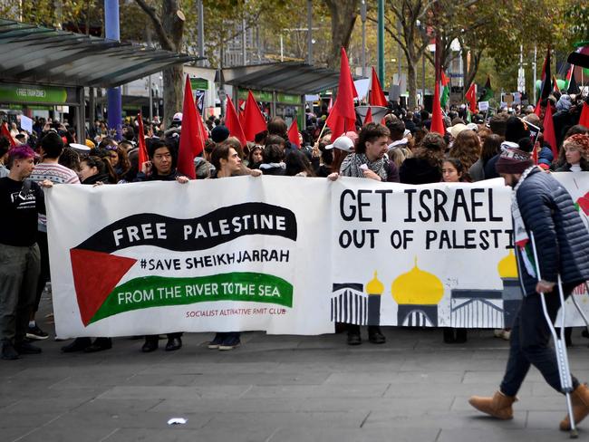 People take part in a protest rally in Melbourne. Picture: AFP