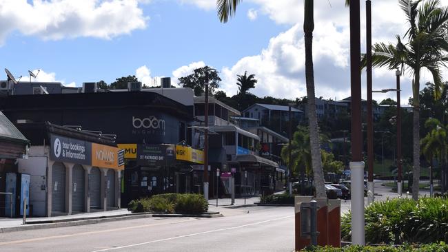 The deserted Airlie Beach Main Street.