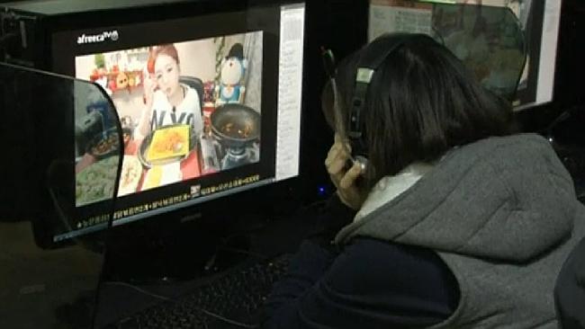 One dedicated follower watches Park in one of her daily food eating web broadcasts. Source: Reuters