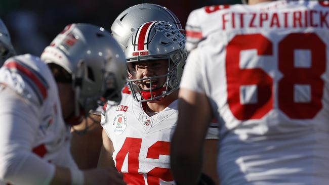 PASADENA, CALIFORNIA - JANUARY 01: Joe McGuire #42 of the Ohio State Buckeyes reacts after a field goal during the second quarter against the Oregon Ducks during the Rose Bowl Game Presented by Prudential at Rose Bowl Stadium on January 01, 2025 in Pasadena, California. (Photo by Ronald Martinez/Getty Images)