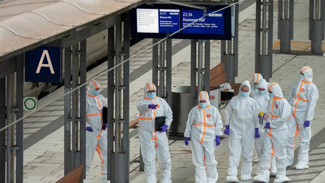 Forensic police officers at the scene of the incident. Picture: Jonas Walzberg / AFP