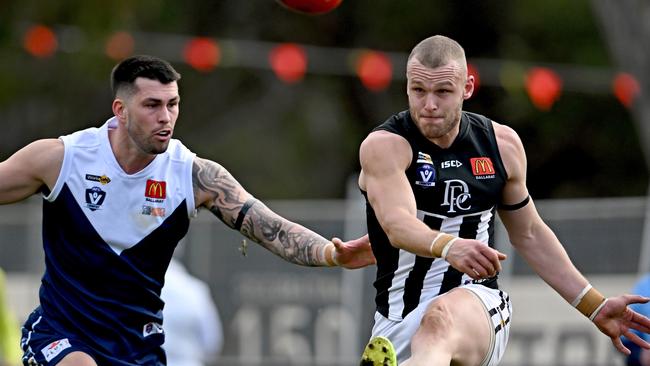 Melton SouthÃs Darby Schilder and DarleyÃs Brett Bewley during the Ballarat league Melton South v Darley football match in Melton, Saturday, June 22, 2024. Picture: Andy Brownbill