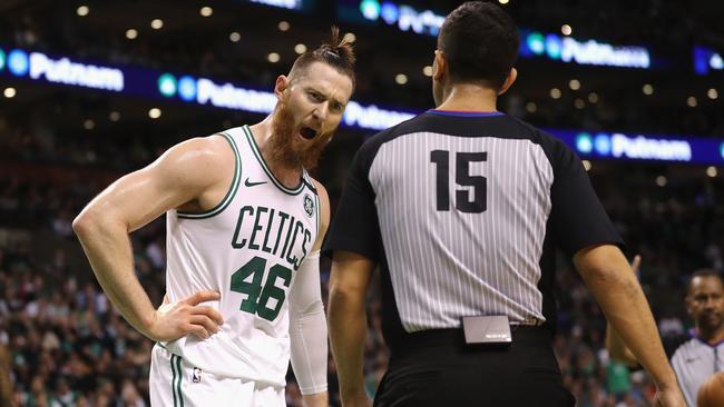 Aron Baynes argues a call with a referee.