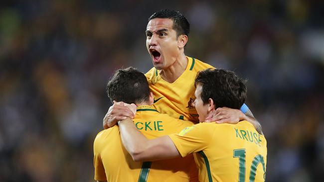 Tim Cahill of Australia celebrates scoring.