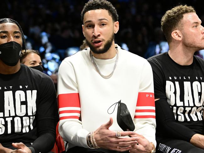 NEW YORK, NEW YORK - FEBRUARY 14:  Ben Simmons of the Brooklyn Nets looks on from the bench during the first half against the Sacramento Kings at Barclays Center on February 14, 2022 in New York City. NOTE TO USER: User expressly acknowledges and agrees that, by downloading and or using this photograph, User is consenting to the terms and conditions of the Getty Images License Agreement.  (Photo by Steven Ryan/Getty Images)