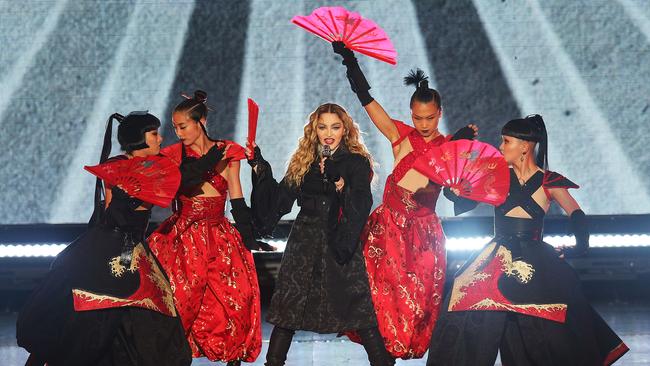 Causing a commotion: Madonna doesn’t seem to own a watch. (Pic: Graham Denholm/Getty Images)