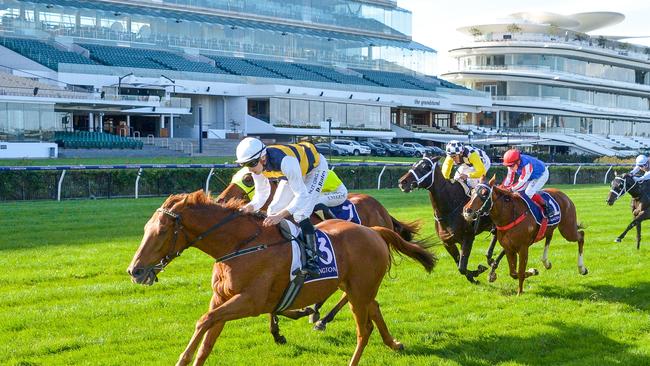 Jockey Declan Bates rides Haky to victory in race 4, the William Newton Vc Handicap, during Anzac Day Race Day at Flemington Racecourse in Melbourne, Saturday, April 25, 2020. (AAP Image/Supplied by Reg Ryan, Racing Photos)  NO ARCHIVING, EDITORIAL USE ONLY