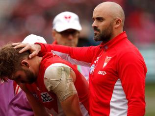 Rhyce Shaw comforts Alex Johnson.