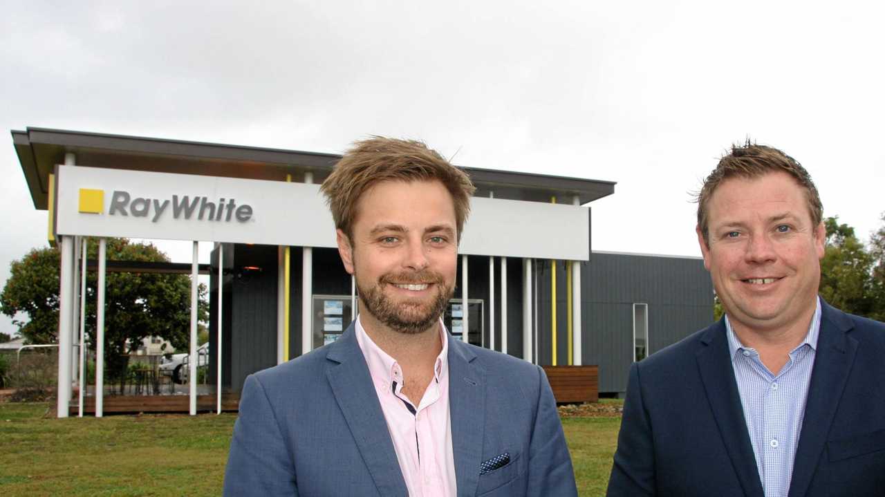 MEETING THE MARKET: James Goldsworthy and Brent Higgins at their new Ray White Kawana office at Birtinya. Picture: Erle Levey