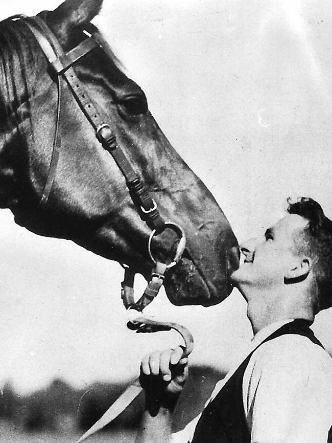 Racehorse Phar Lap with trainer Tommy Woodcock in 1932.