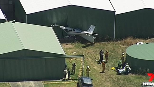 A light plane has slammed through the wall of a hangar at Goolwa Airport. Picture: 7NEWS