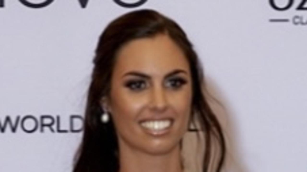 Miss World model swaps steel cap boots for stilettos