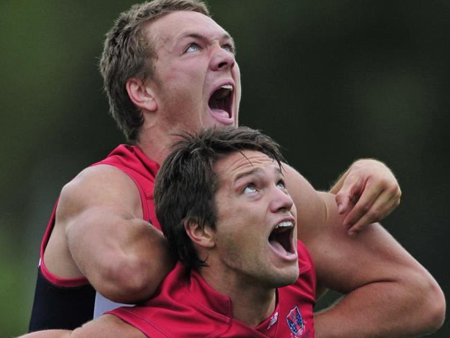 Once brothers in arms, Max Gawn and Stefan Martin battle at Melbourne training.