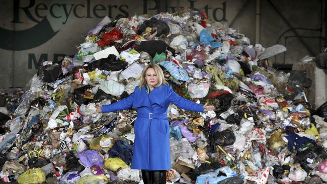 Salisbury mayor Gillian Aldridge standing in front a pile of rubbish at Edinburgh. Picture: Dean Martin