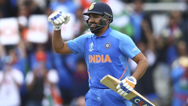 Rohit Sharma celebrates his second century of the tournament.