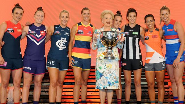 The inaugural AFLW captains and ambassador Susan Alberti.